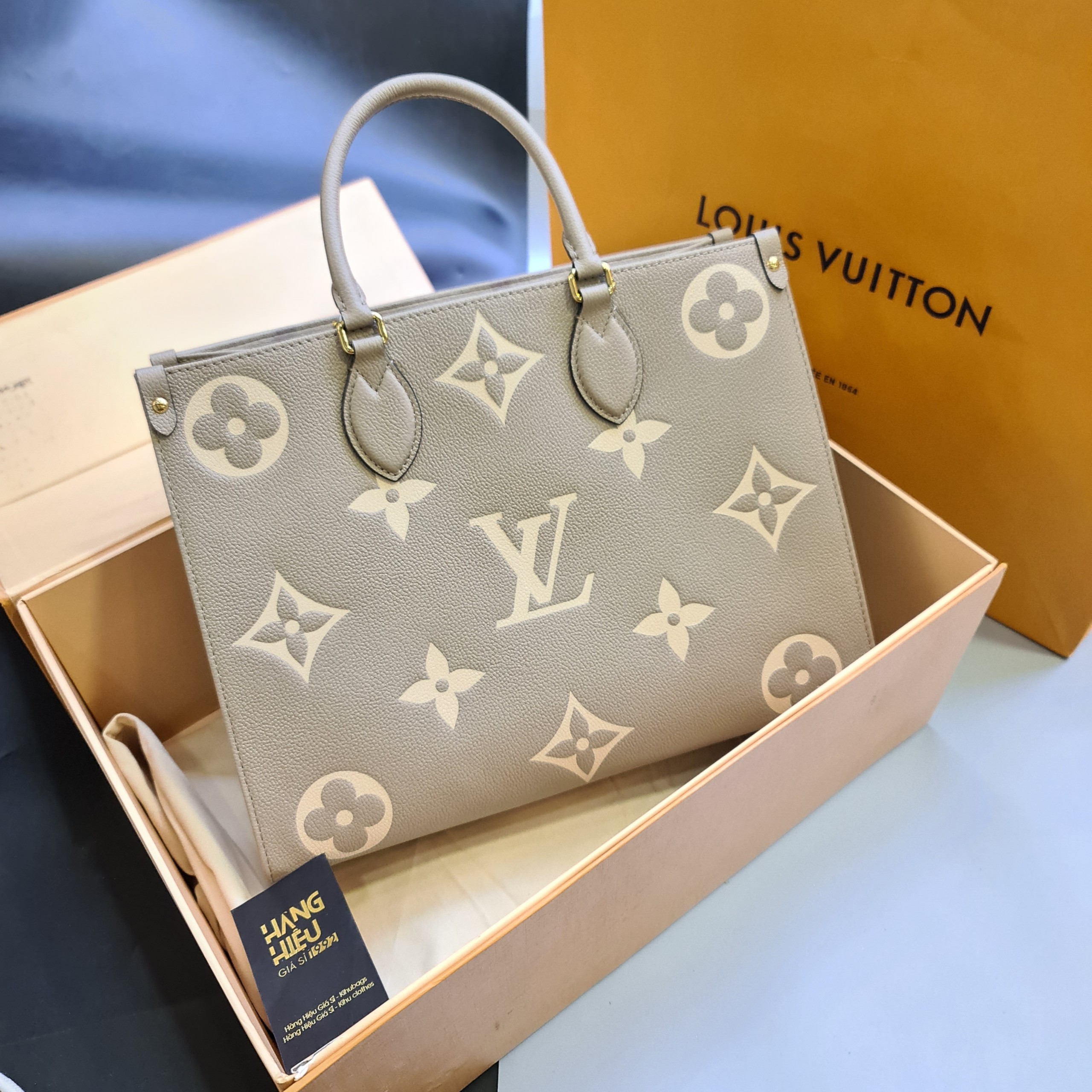 Onthego MM Bicolour Monogram Empreinte Leather  Handbags  LOUIS VUITTON